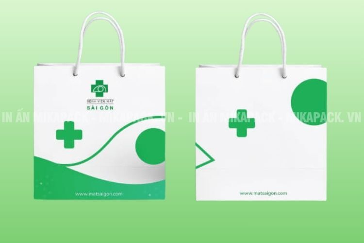 Mẫu túi giấy đựng thuốc sử dụng tông màu trắng – xanh lá.